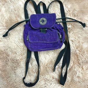 Kipling mini vibrant purple backpack